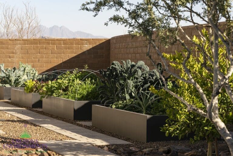Custom backyard design with herb garden and metal planters.