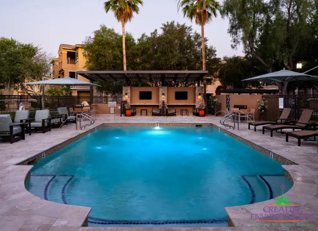Custom community amenities with community pool, cantilevered shade structure and outdoor TVs.