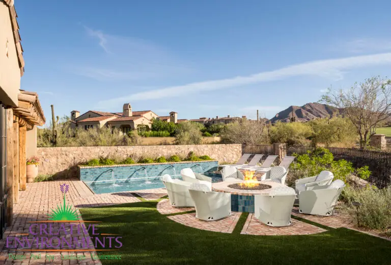 Backyard design with fire pit and multiple seating areas