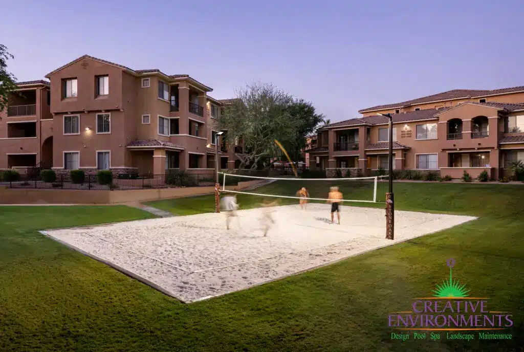 Custom community amenities with sport court lighting, volleyball court and real grass.