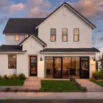 Front yard design with pavers and grass