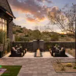 Front yard design with fire table and sunken seating area.