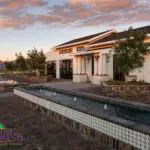 Custom community amenities with linear water features, fire pit and clubhouse.