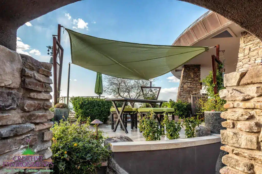 Backyard design with shaded outdoor dining area