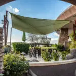 Backyard design with shaded outdoor dining area