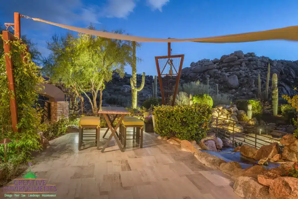 Backyard design with custom trellis and cacti