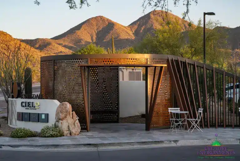 Custom community entranceway with unique metal shade structure that doubles as a metal statement piece.