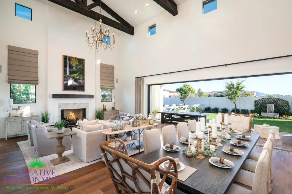Custom indoor/outdoor design fusion with trellis, real grass and water fountain.