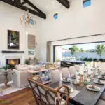 Custom indoor/outdoor design fusion with trellis, real grass and water fountain.