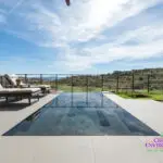 Pool and lounge chairs.