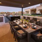 Custom backyard design wtih bocce ball court and outdoor kitchen