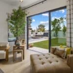 Custom backyard design with seamless indoor/outdoor design fusion.
