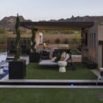 Custom backyard design with large planters, bubblers and custom metal dividers.