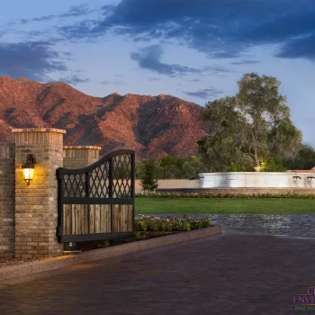 11454-162 Custom community entrance with large water fountain, metal entry gate and roundabout driveway.