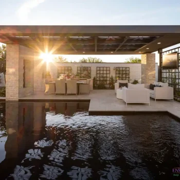 6002 (8) Custom backyard design with custom metal shade structure, metal trellis and black pool.