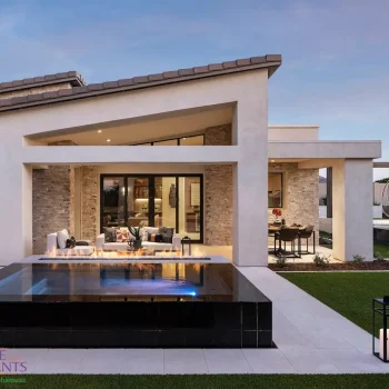 Bridle_Ranch_Ambrosia_Casita_5174(LOGO) Custom backyard design with black tiled hot tub, artificial turf and hanging swing.