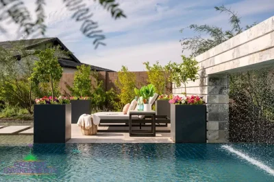 Backyard design with metal planters and rain curtain.