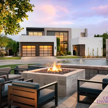 Residence 2 (1) Custom front yard design with artificial turf, fire pit and metal scupper water feature into pond.