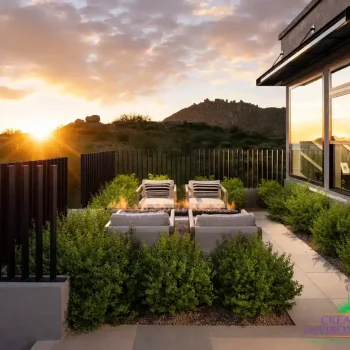 Sereno_Canyon_Caullins_Patio_4389(LOGO) Custom backyard design with metal fencing, fire table and outdoor seating area.