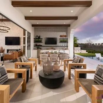 Sterling_Grove_Hastings_Patio_7295LOGO Custom indoor/outdoor fusion with wooden ceiling beams, multiple seating areas and pool with baja step.