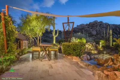Backyard design with custom trellis and cacti