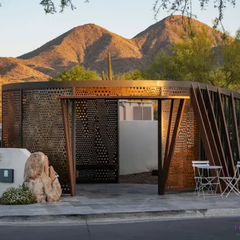The Adero-WM-4 Custom community entranceway with unique metal shade structure that doubles as a metal statement piece.