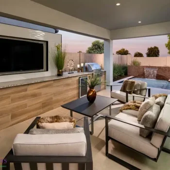 The Ballantyne (2) Custom backyard design with outdoor tv, water feature into pool and outdoor BBQ.