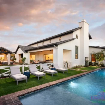 The Pradera (11) Custom backyard design with artificial turf, traditional blue pool and organized planting.
