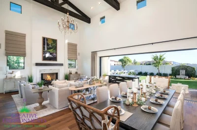 Custom indoor/outdoor design fusion with trellis, real grass and water fountain.