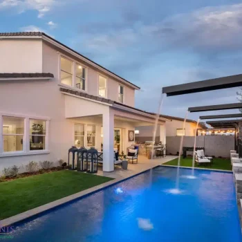 The Savannah (4) Backyard design with cantilevered water scuppers into pool