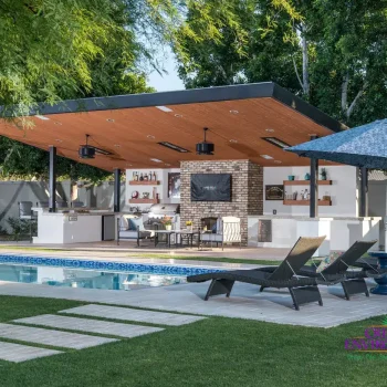 WM2_4420 Custom backyard design with real grass, angled shade structure and outdoor entertainment area.