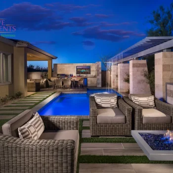 Windgate Model Pool Custom backyard design with rain curtain water feature, cantilevered fire table and multiple seating areas.