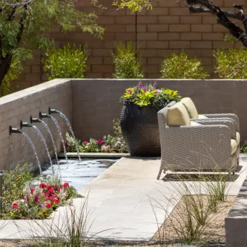 cheval (16) Custom backyard design with metal scupper water feature, large planter and fire table.
